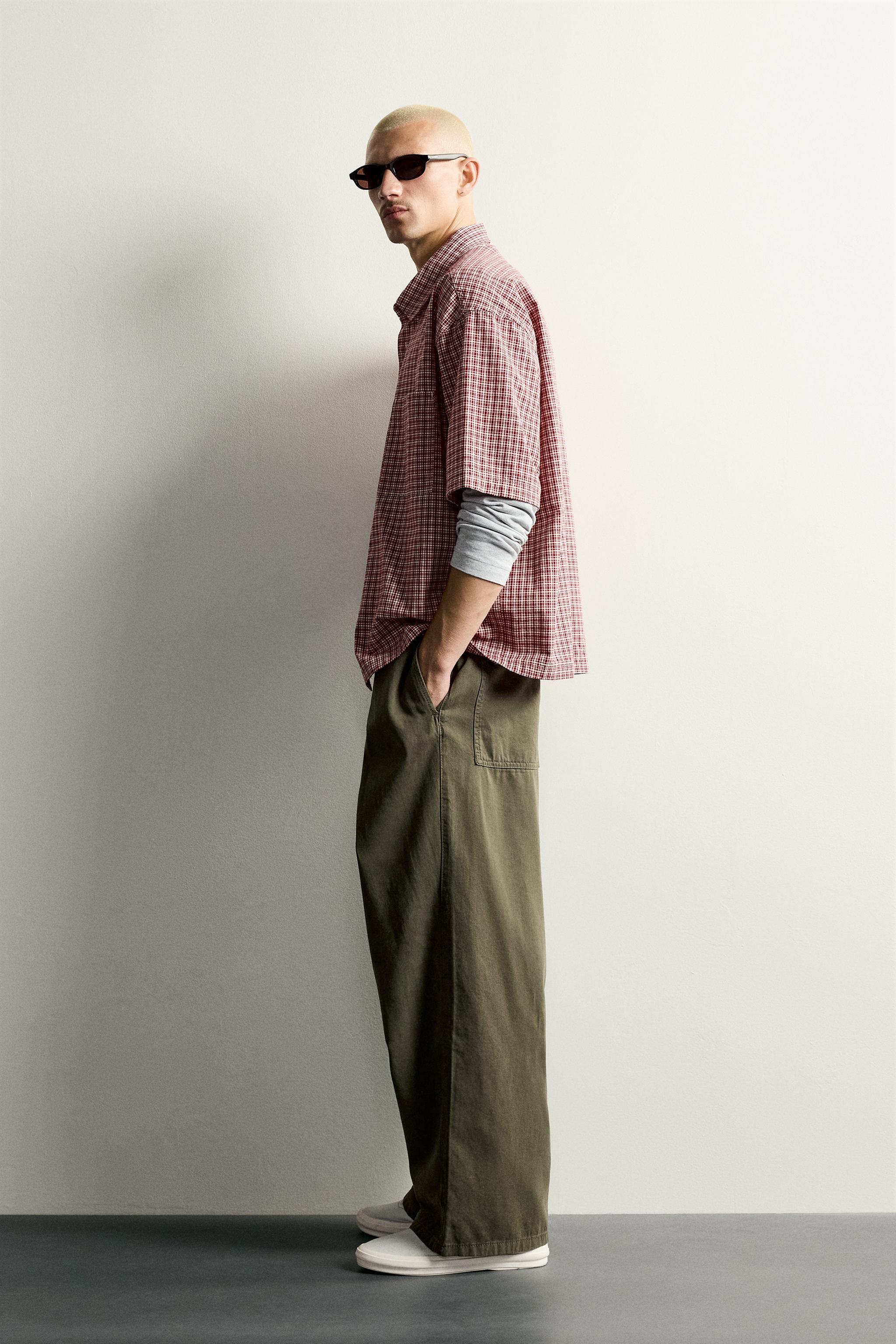PLEATED PANTS WITH METAL HOOK